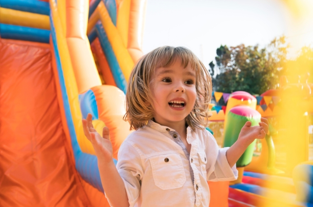 Girl playing on inflatable in Jennings, LA